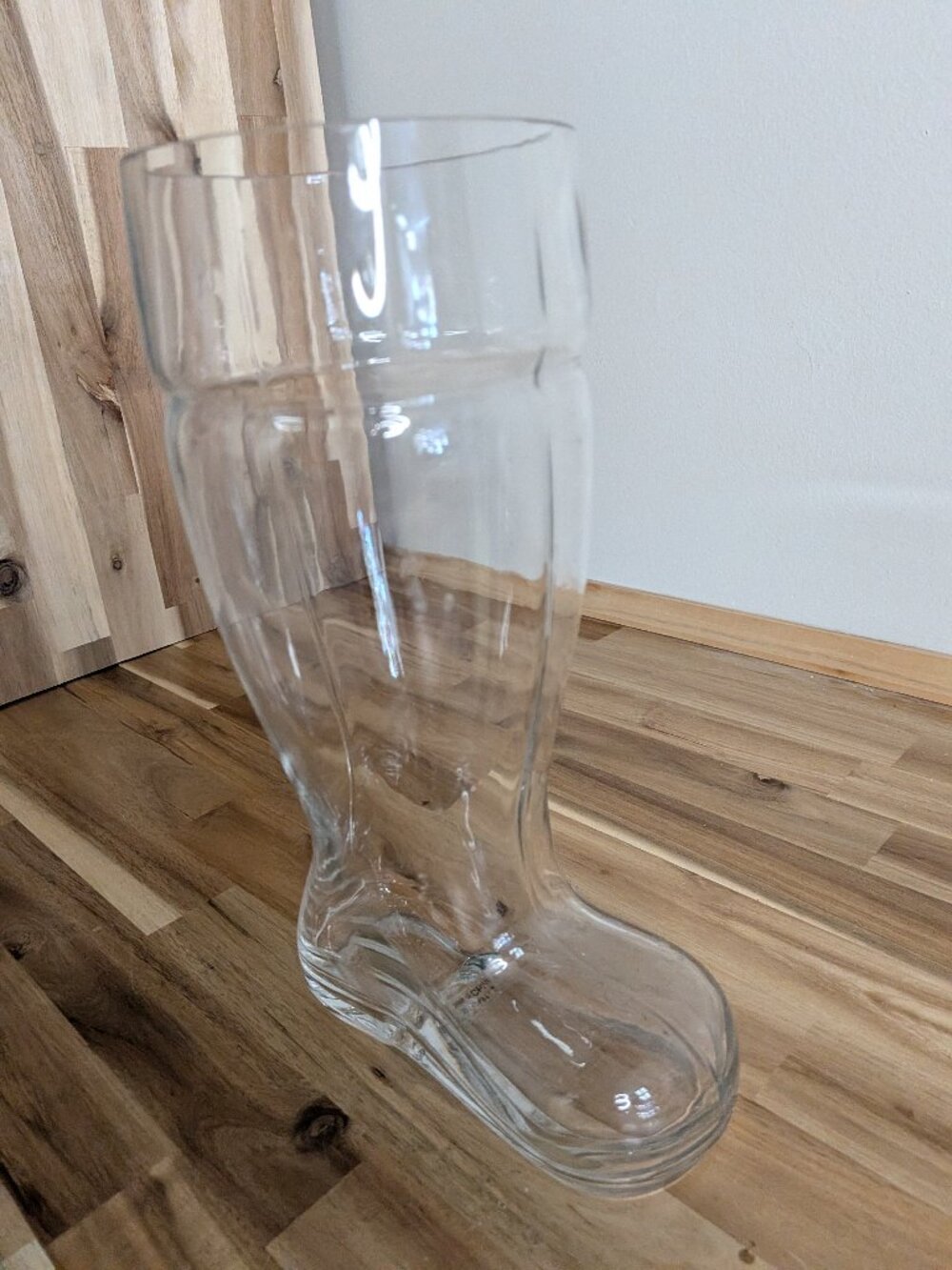Glass drinking boot.